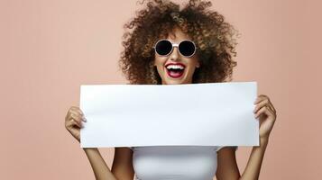 AI generated Cute blonde girl with curly hair wearing sunglasses laughing holding a white blank sheet for an ad photo