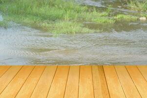 landscape with flooded field and wood floor photo