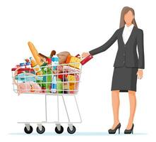 Woman with shopping cart full of fresh products. Grocery store supermarket. Food and drinks. Milk, vegetables, meat, chicken cheese, sausages, salad, bread cereal steak egg. Flat vector illustration