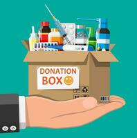 Cardboard box full of drugs in hand. Needed items for donation. Different pills bottles, healthcare, pharmacy. Medical drug vitamin, antibiotic. Donate, charity, thanksgiving. Flat vector illustration