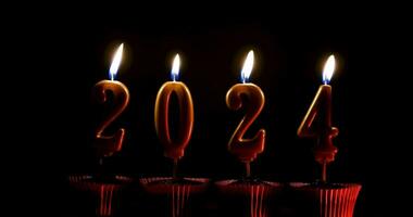 candles in the shape of the number 2024 are lit video