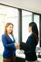 Business partnership handshake concept.Photo two coworkers handshaking process.Successful deal after great meeting. photo