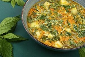 Healthy vegan nettle soup photo