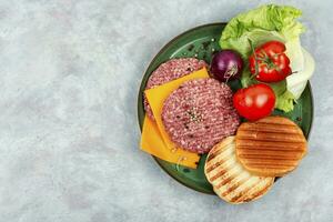 Raw ground burger patties for cooking. photo