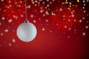 New Year's toys, decorations and other items on a red abstract background. photo