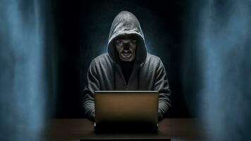 AI generated Hacker man typing on laptop, hacking computer system. male in mask and hoodie .AI Generated photo