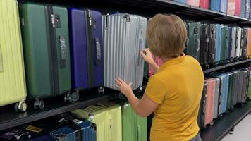 Choosing Luggage, Colorful Travel Gear Selection video