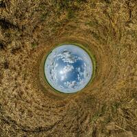 blue hole sphere little planet inside green grass round frame background photo