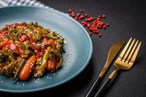 Mix of vegetables corn, carrots, peppers, broccoli, onions in teriyaki sauce photo