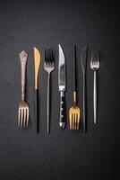 Kitchen knife and fork made of steel with copy space photo