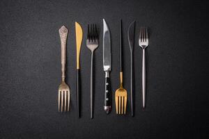 Kitchen knife and fork made of steel with copy space photo