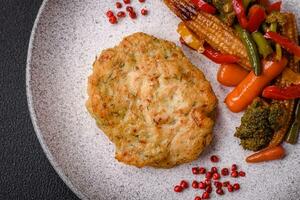 Delicious fresh fried minced fish cutlets with spices and herbs photo