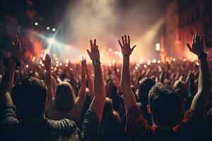 AI generated Crowd at concert with raised hands and bright stage lights in background, Crowd cheering at a live music concert and raising their hands, AI Generated photo