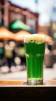 AI generated pint of green beer with a blurred St. Patrick's Day parade in the background. photo