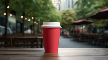 ai generado rojo papel vaso con blanco frente, realista en un Bosquejo modelo en un de madera mesa foto