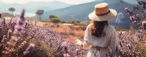 AI generated woman in hat in a field of lavender photo