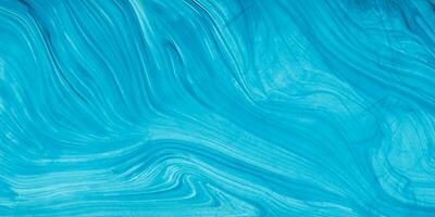 blue abstract background with wavy lines photo