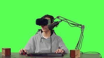 POV of streamer uses vr glasses to broadcast live action gameplay, sitting at his desk to play online videogames. Modern person content creator recording gaming stream, virtual reality headset. video