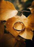 ai generado dos oro anillos descanso en un superficie de hojas foto