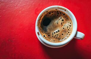 AI generated a cup of coffee is placed on a red background photo