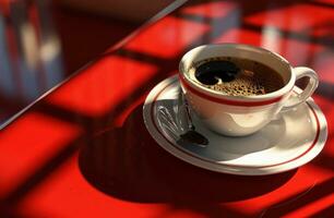 AI generated a cup of coffee is placed on a red background photo