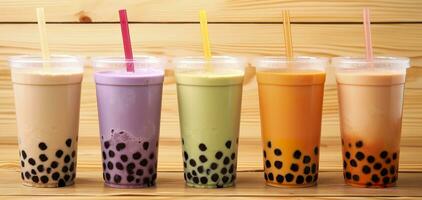 AI generated Plastic cups of different tasty bubble tea on wooden background. Generative AI photo