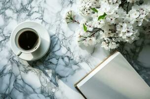 AI generated a white book and a cup of coffee on a marble surface with flowers photo