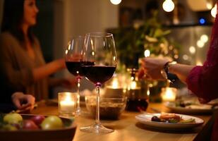 ai generado personas Bebiendo rojo vino a un cena fiesta comida foto