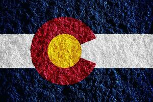 Flag of Colorado USA state on a textured background. Concept collage. photo