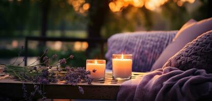 ai generado velas y lavanda flores en el sofá con velas en el madera foto