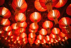 AI generated many multicolored paper lanterns hanging in the air, photo