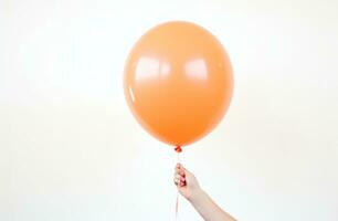 AI generated person holding on to orange balloon party. photo