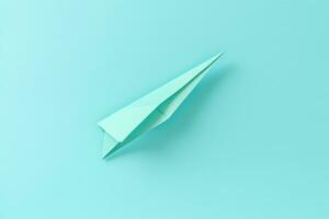 AI generated paper airplane isolated on pale turquoise photo