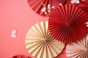 AI generated paper fans with leaves on red background photo