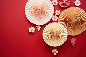 AI generated paper fans with leaves on red background photo