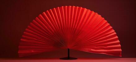 AI generated red decorative paper fan on a table, photo