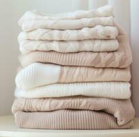 AI generated sweaters in stack with different colors for different occasions a sweater, photo