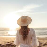 AI generated woman is looking at the sun at the beach in white with hat, photo