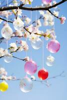 AI generated A stunning photo of a blooming cherry blossom tree with colorful Easter eggs hanging from its branches