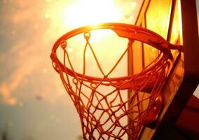 ai generado baloncesto remojar desde cesta red en baloncesto campo foto