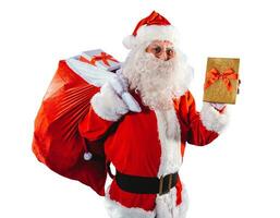 contento Papa Noel claus es Listo a entregar Navidad regalos foto