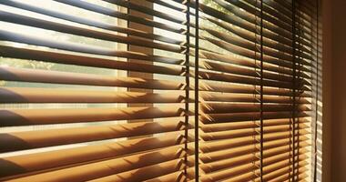 AI generated The Aesthetic Allure of Evening Sunlight Dancing on Wooden Window Blinds photo