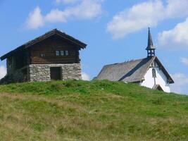 a small building with a steeple photo