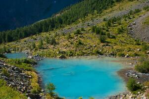 a mountain with a lake photo