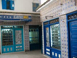 a blue door with a white window photo