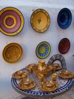 a table with plates and bowls on it photo