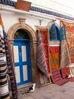 a colorful rug on the ground photo