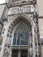 a large building with a large ornate door photo