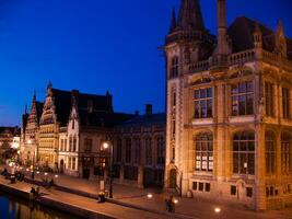 a large building with a clock tower photo