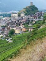 a hill with a castle photo